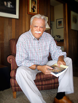 Kevin Clark Portrait Holding Self-Portrait with Expletives